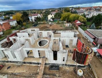 Bytový dům, stavební pozemky - Dolní Břežany